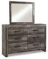 Wynnlow King Crossbuck Panel Bed with Mirrored Dresser, Chest and Nightstand